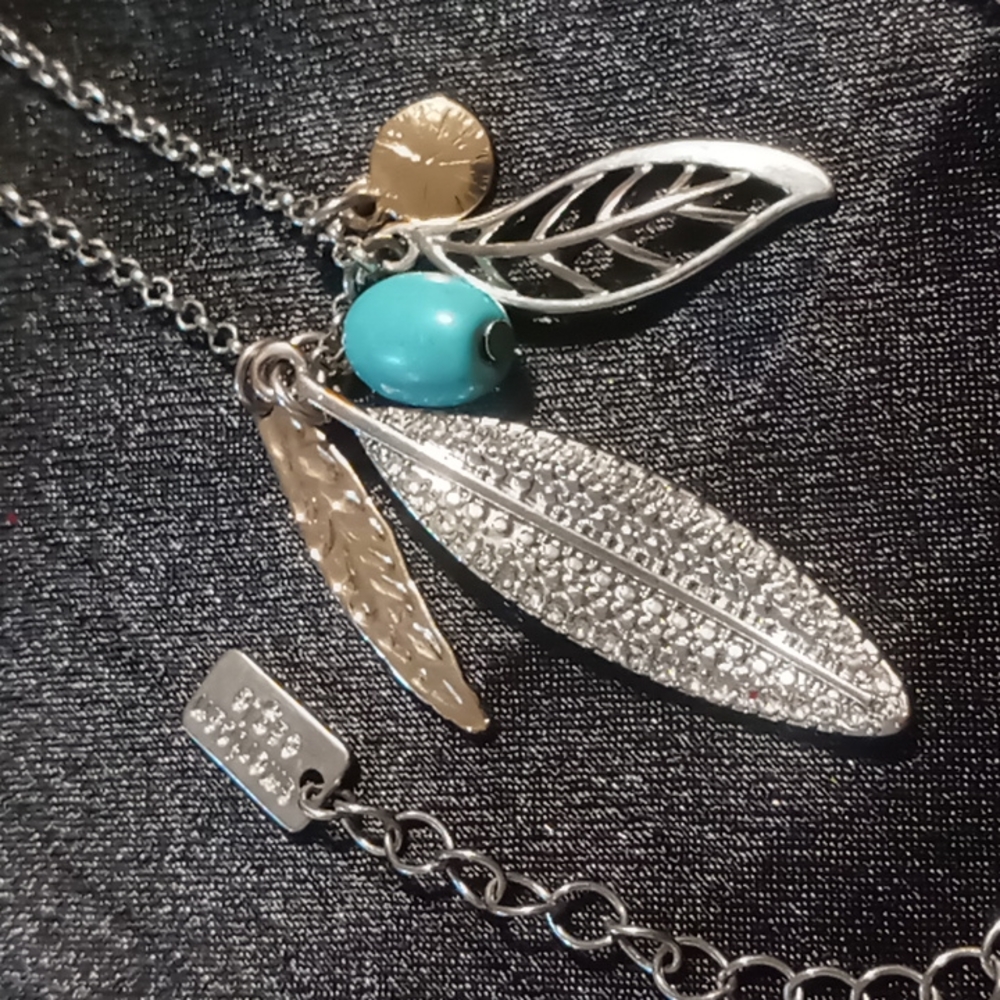 American eagle charm long necklace in silver tone 24 inches long.